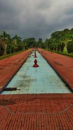 Road against cloudy sky