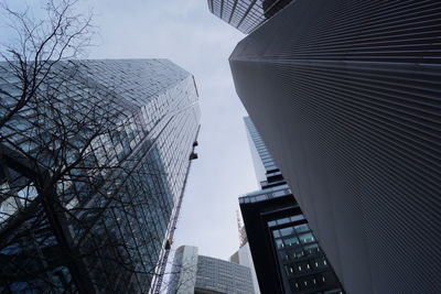 Low angle view of skyscrapers against sky