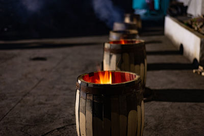 Close-up of illuminated fire against blurred background