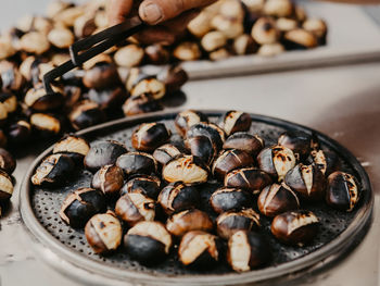 High angle view of roasted coffee beans on table