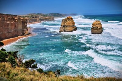 Scenic view of sea against blue sky