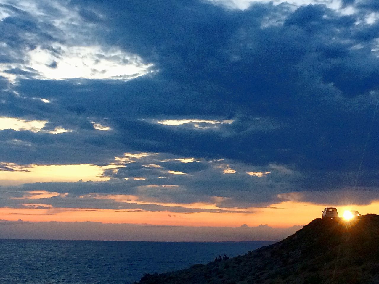 SCENIC VIEW OF SEA DURING SUNSET