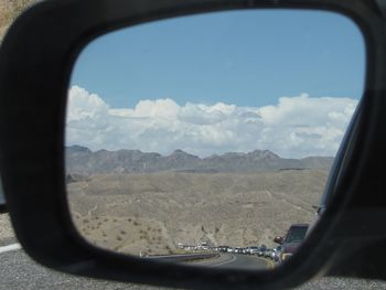 Cropped image of airplane on landscape