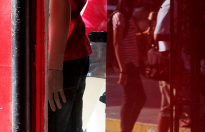 Close-up of woman relaxing on bed