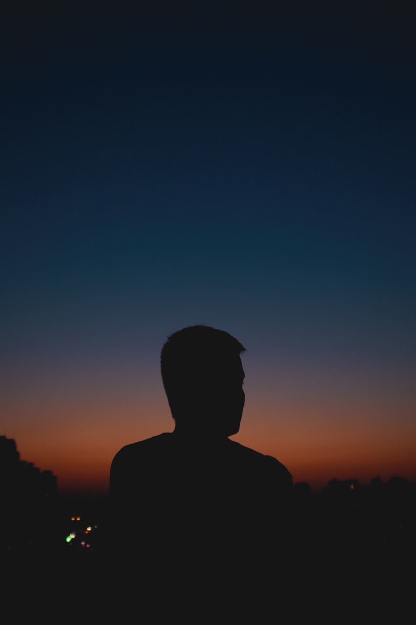 PORTRAIT OF SILHOUETTE MAN STANDING AGAINST SKY DURING SUNSET