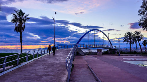 View of suspension bridge in city