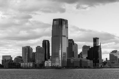 Modern buildings in city against sky