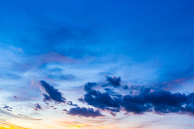 Low angle view of dramatic sky during sunset