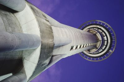 Low angle view of building against blue sky. aukland tv-tower