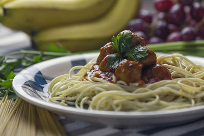 Close-up of pasta in plate on table