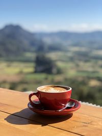 Coffee cup on table