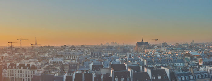 High angle view of cityscape against sky during sunset