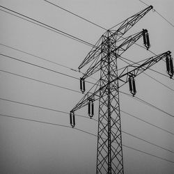 Low angle view of electricity pylon