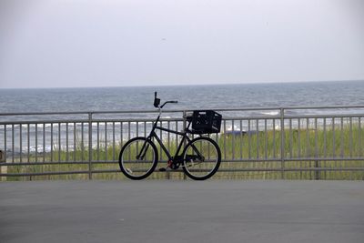 Bicycle parked on beach