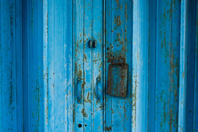 Full frame shot of blue old closed door