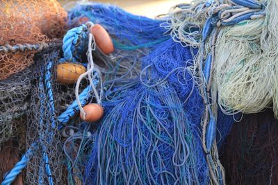 Close-up of fishing net at harbor