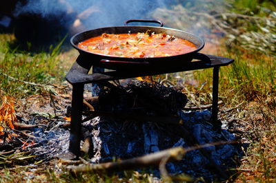 High angle view of food on barbecue grill paella