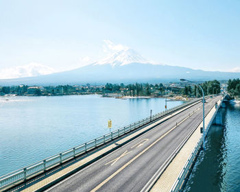 Bridge over river against sky