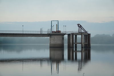 Bridge over river against sky