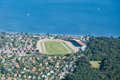 High angle view of cityscape and sea