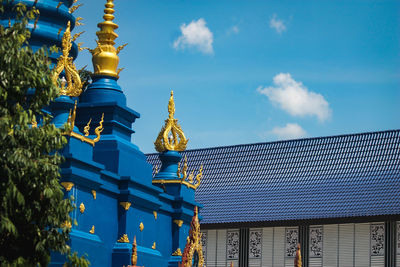 Low angle view of building against blue sky