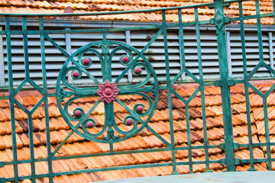 Close-up of railing against white background