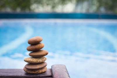 Stack of stones in swimming pool