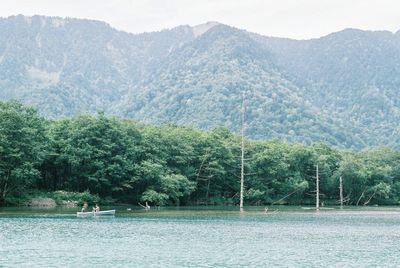 Scenic view of river and mountains