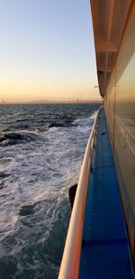 Scenic view of sea against clear sky during sunset