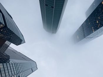 Low angle view of modern buildings against sky