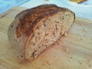 High angle view of bread on cutting board