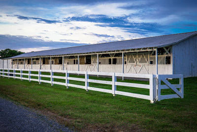 House on field against sky