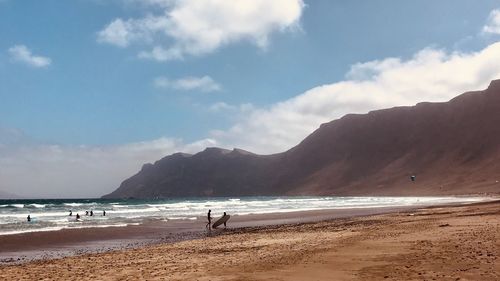 Scenic view of beach against sky