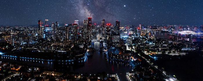 Aerial bird's eye view of famous canary wharf skyscraper complex, isle of dogs in london