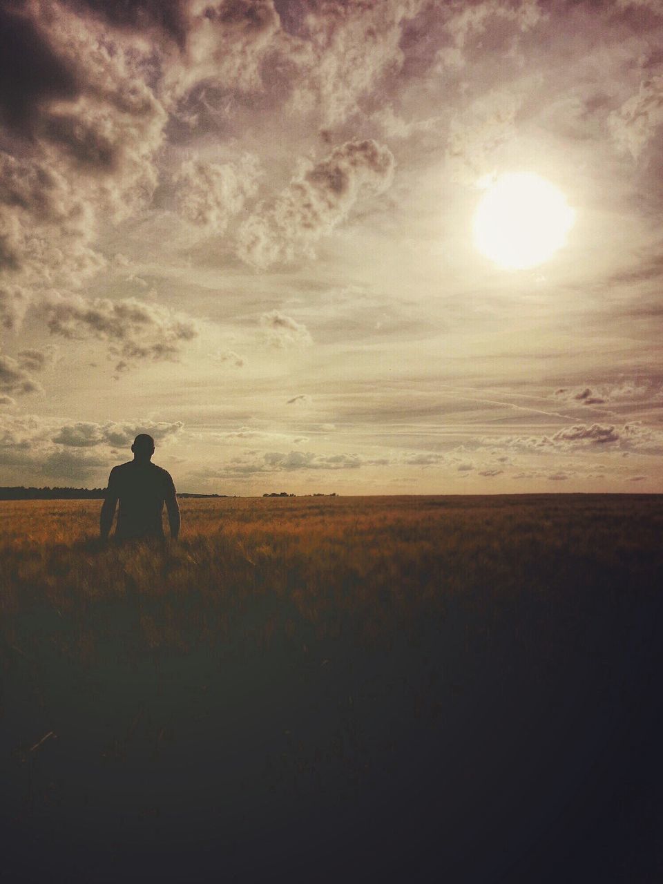 sky, sun, lifestyles, leisure activity, horizon over water, tranquil scene, sunset, tranquility, silhouette, scenics, men, sea, cloud - sky, beauty in nature, standing, landscape, nature, rear view