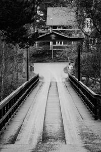 View of bridge over plants in winter