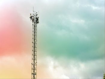 Low angle view of communications tower against sky