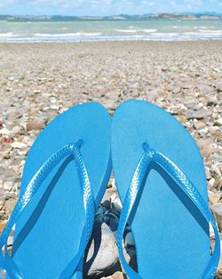 Close-up of blue sea against sky