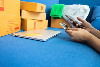 Close-up of man using mobile phone