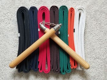 High angle view of multi colored pencils on shelf