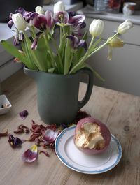 Close-up of tulips in vase on table