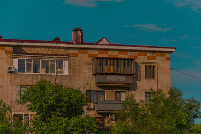 Low angle view of old building against sky