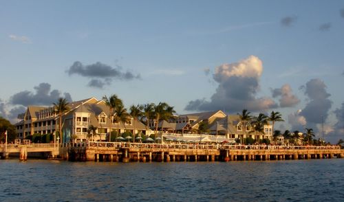 View of built structure by sea