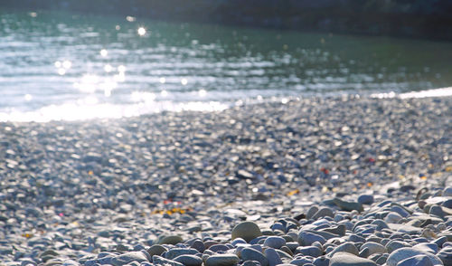 Close-up of pebbles on beach