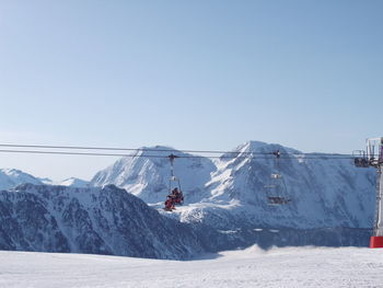 Snow covered mountain against clear sky