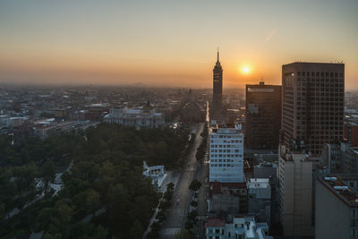 High angle view of cityscape against sky during sunrise