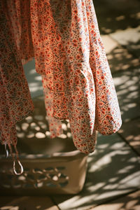 Close-up of orange leaf hanging on plant