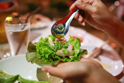 Close-up of hand holding food