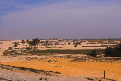 Scenic view of desert against sky