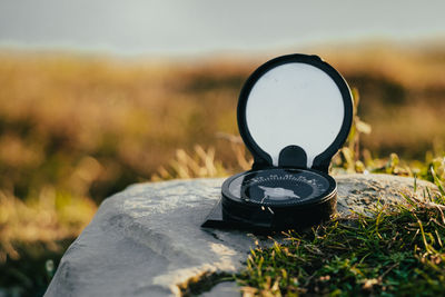 Close-up of camera on field
